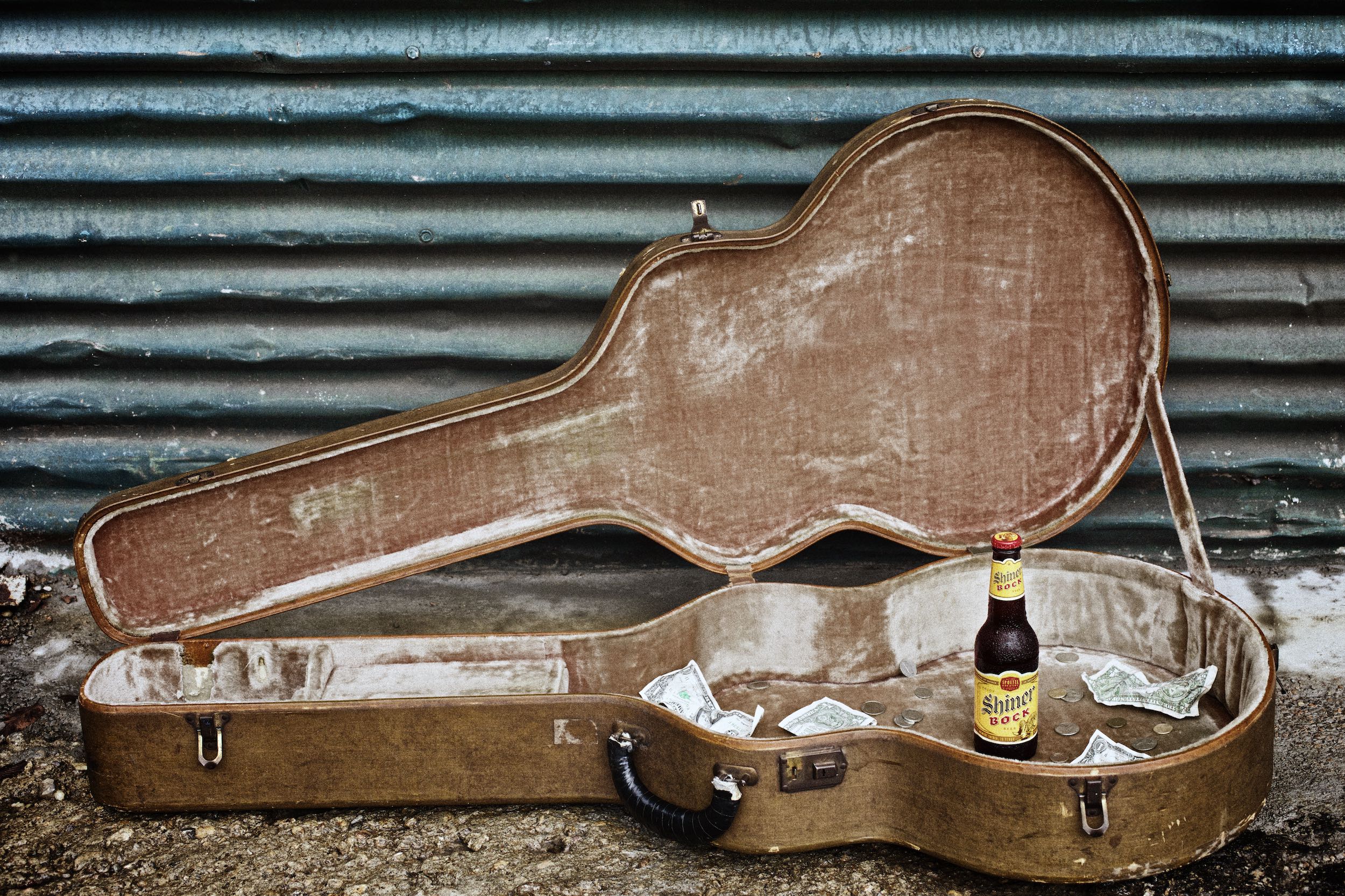 Jody Horton Photography - Shiner Bock Billboard for Austin City Limits with open guitar case and cold bottle of Shiner left as a tip.