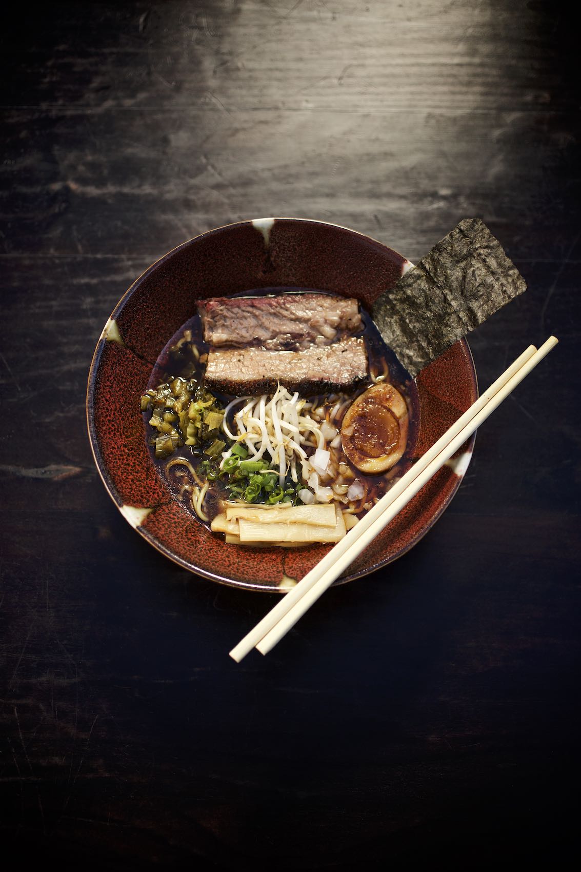 Jody Horton Photography - Kemuri ramen noodles with assorted toppings and chopsticks. 
