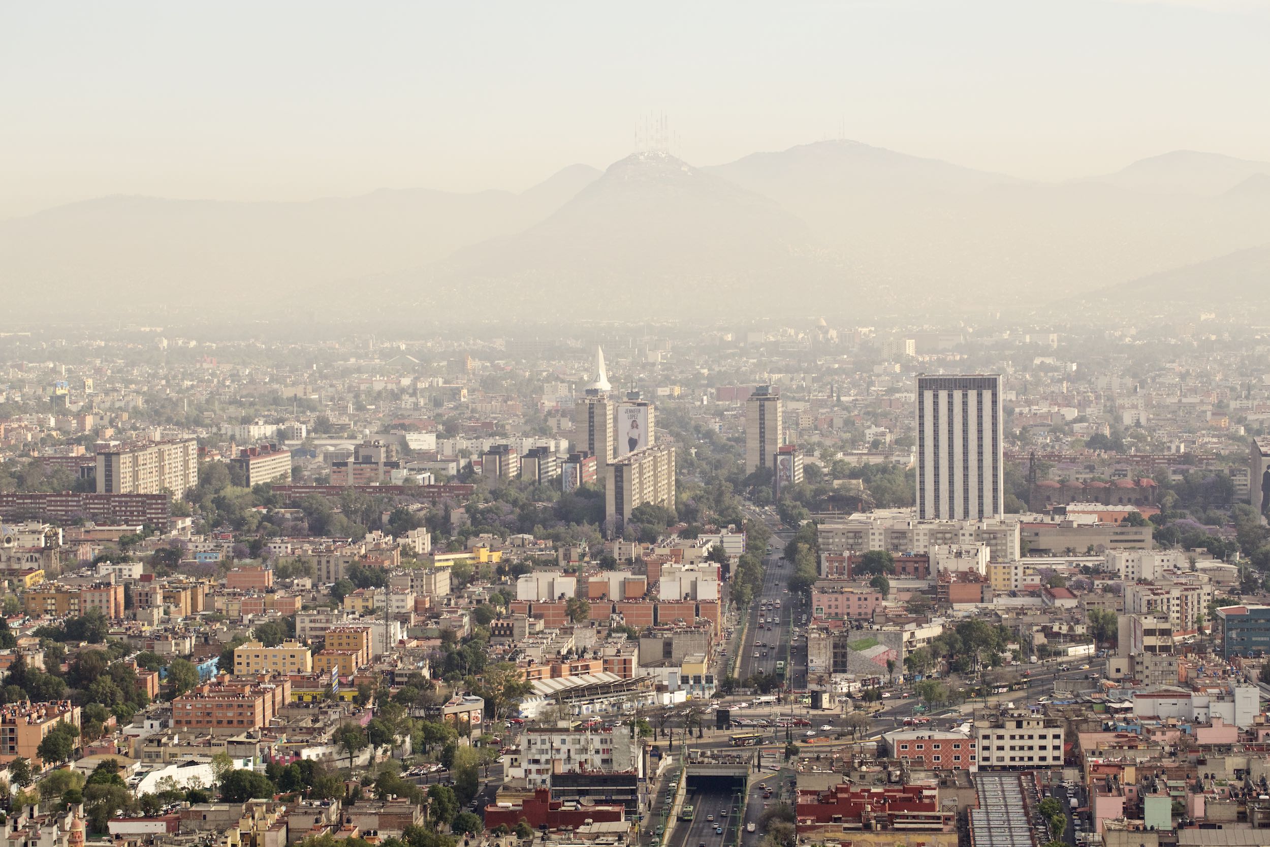 Jody Horton Photography - Overview of Mexico City set in front of a range of mountains.