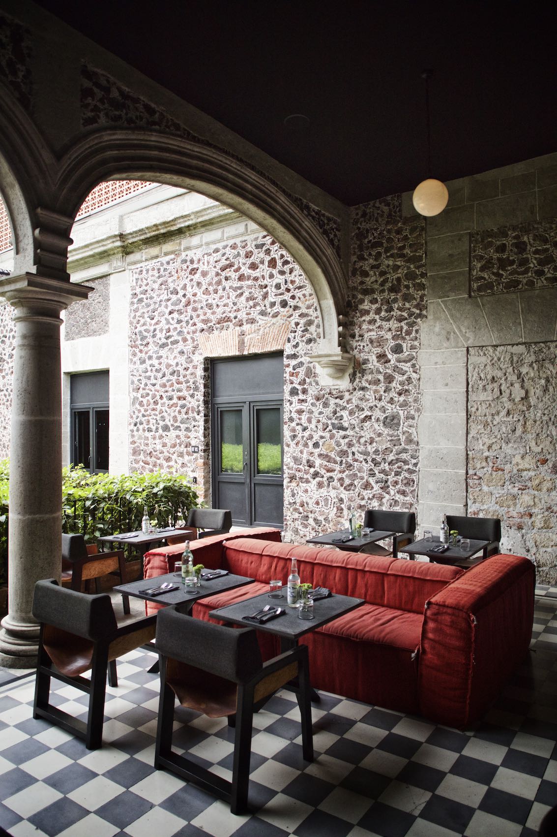Jody Horton Photography - Outdoor restaurant with stone walls in Mexico City 