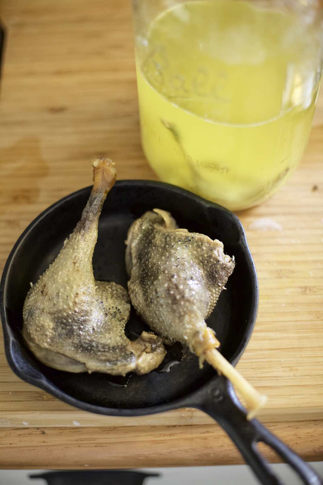 Jody Horton Photography - Goose legs in a small cast iron skillet. 