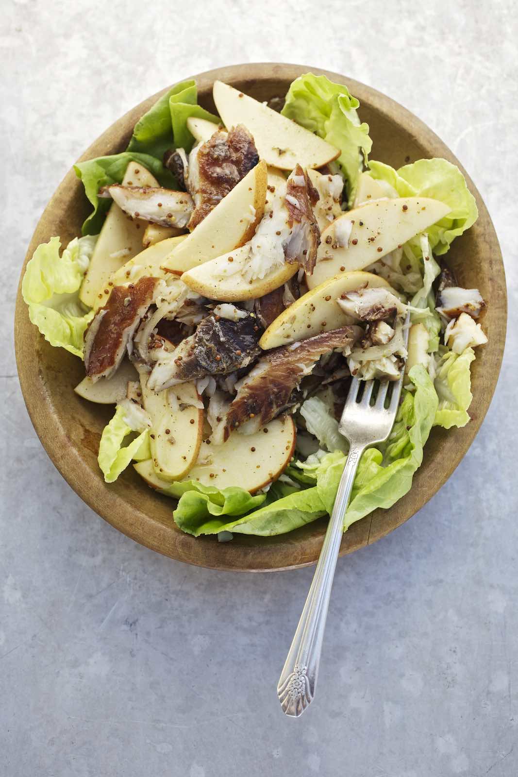 Jody Horton Photography - Salad topped with sliced pear and grilled fish. 