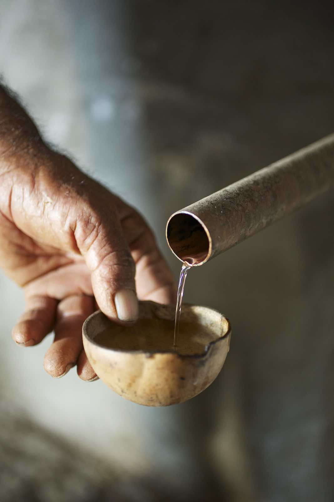Jody Horton Photography - Mezcal pouring into a jícara. 