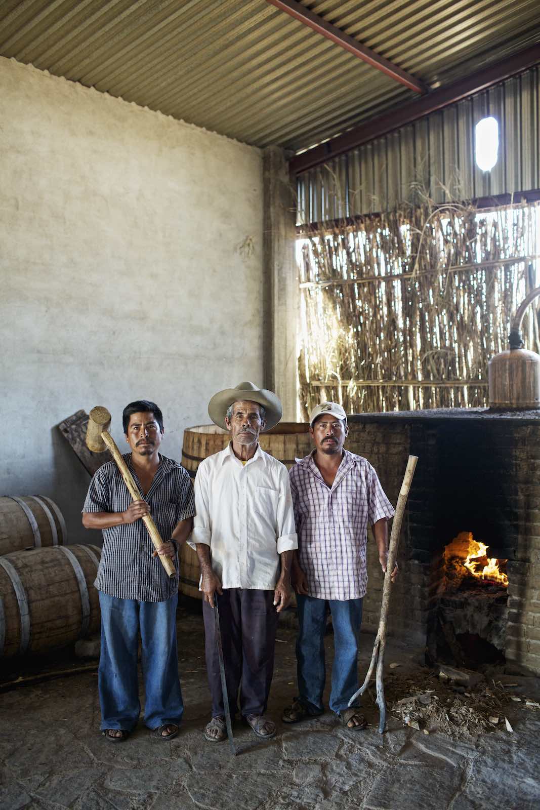 Jody Horton Photography - Mezcal workers standing together during production. 