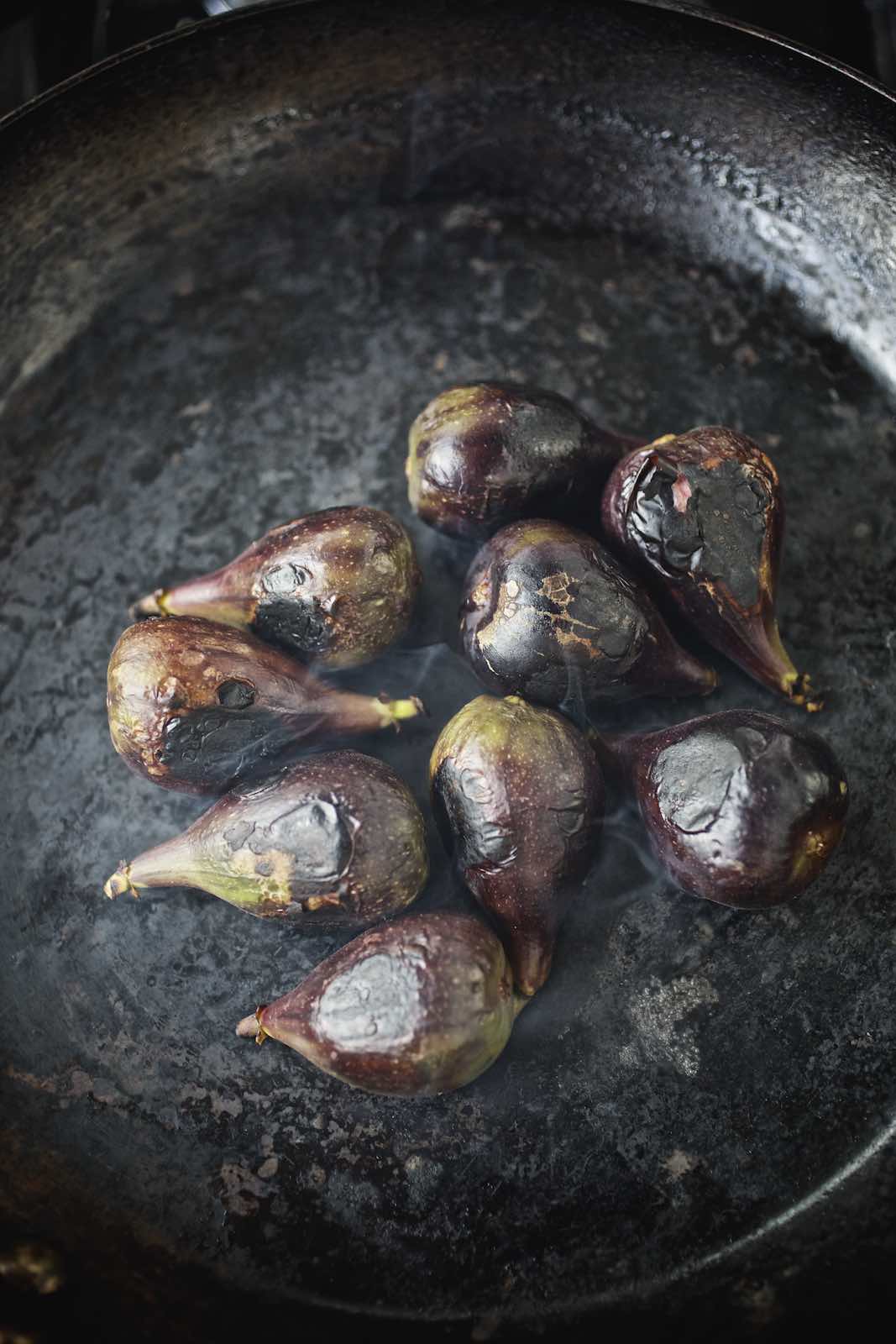 Jody Horton Photography - Figs blistering in a steel skillet. 