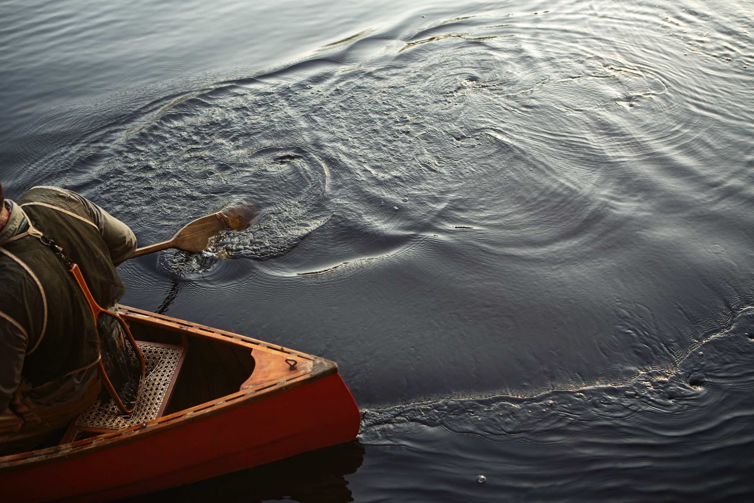 Jody Horton Photography - Tail end of canoe in dark water, shot for Jack Daniels Single Barrel.