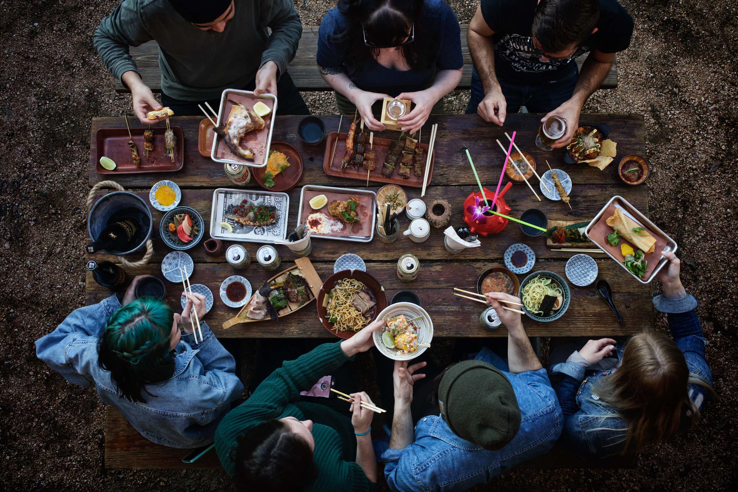 Jody Horton Photography - Outdoor picnic spread on wood table.