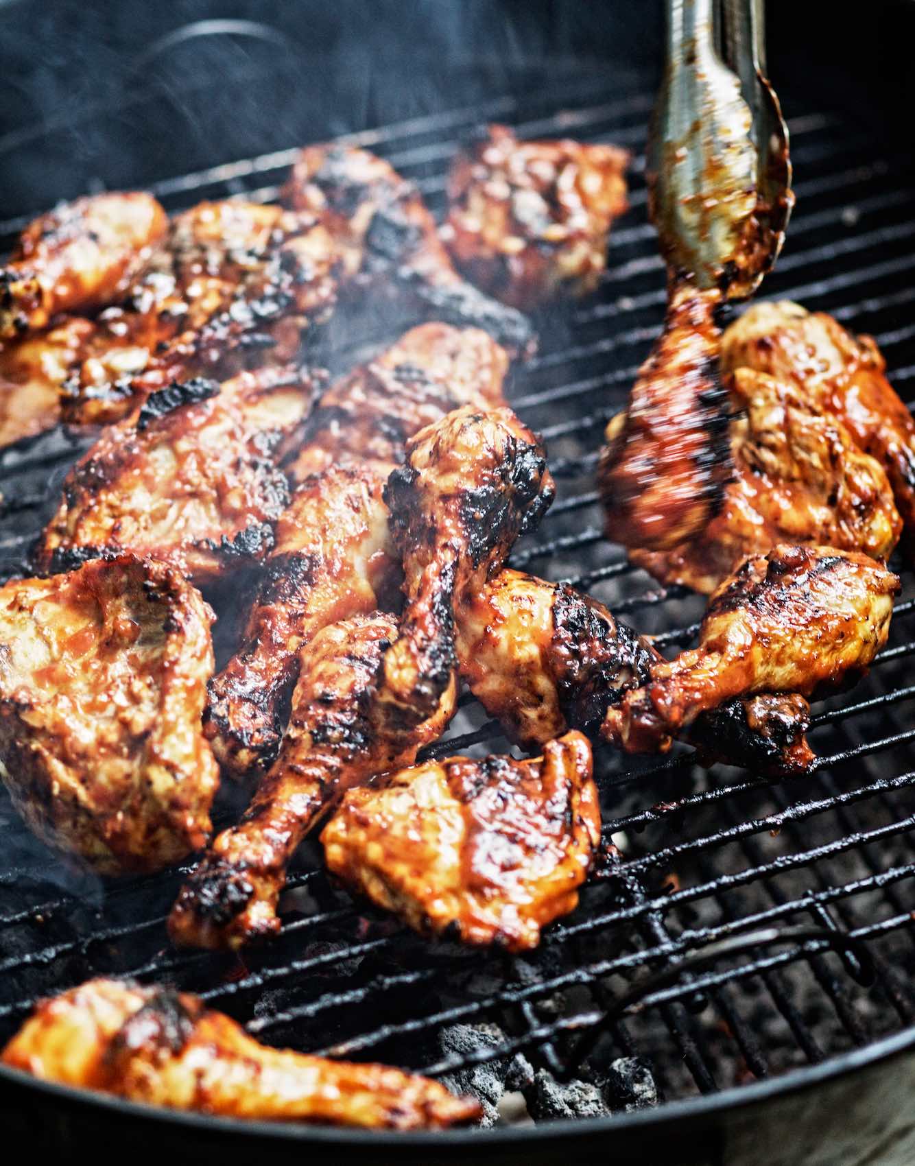 Jody Horton Photography - Chicken wings cooking on grill.