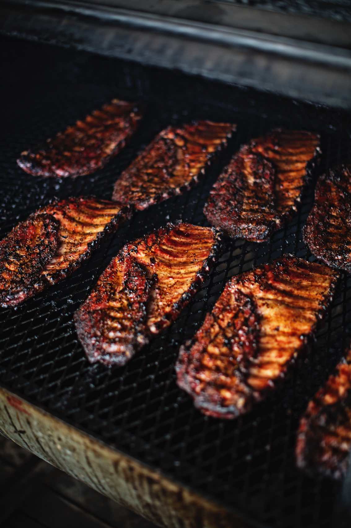 Jody Horton Photography - Barbecued ribs cooking in smoker. 