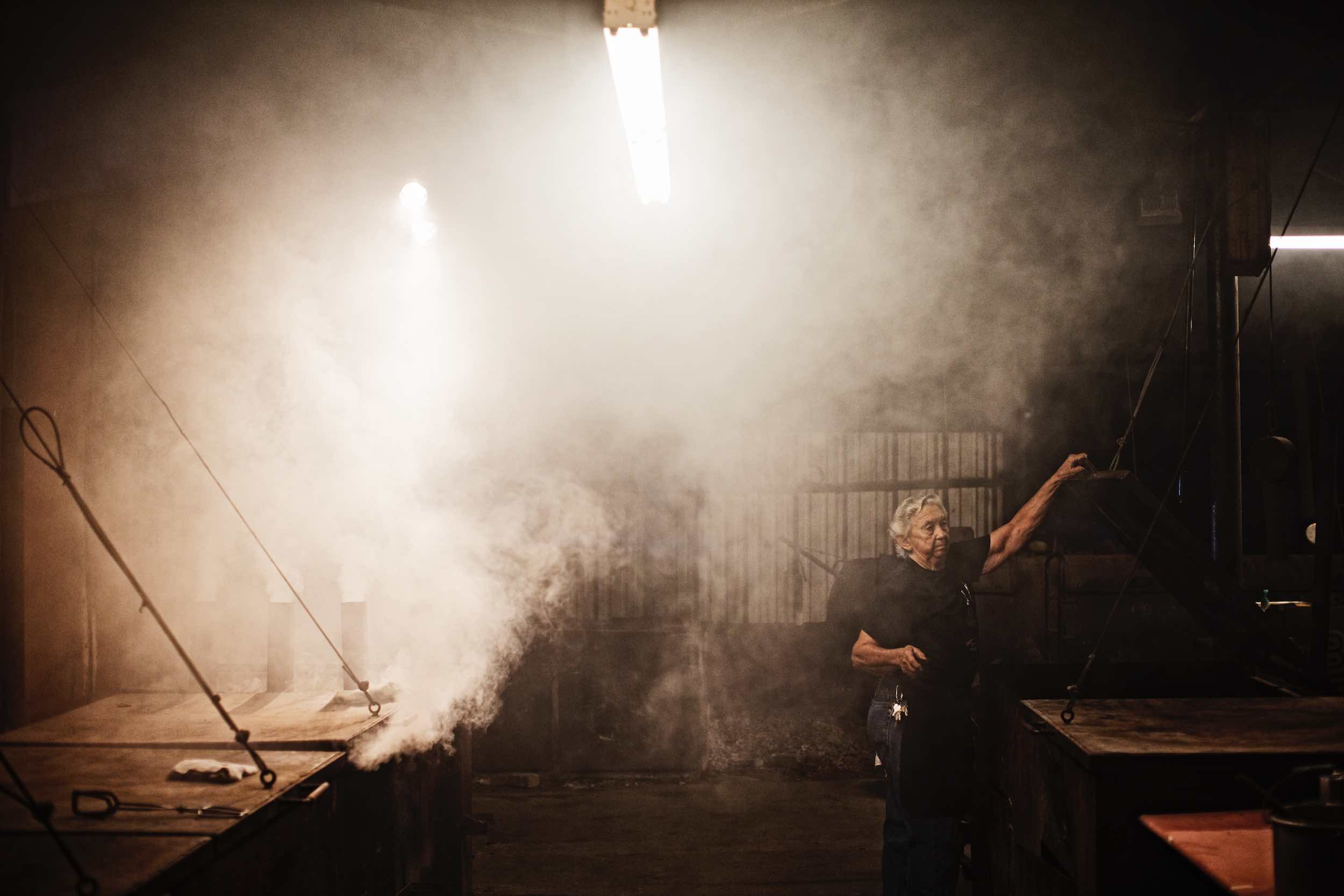 Jody Horton Photography - Pit master working in smoke. 