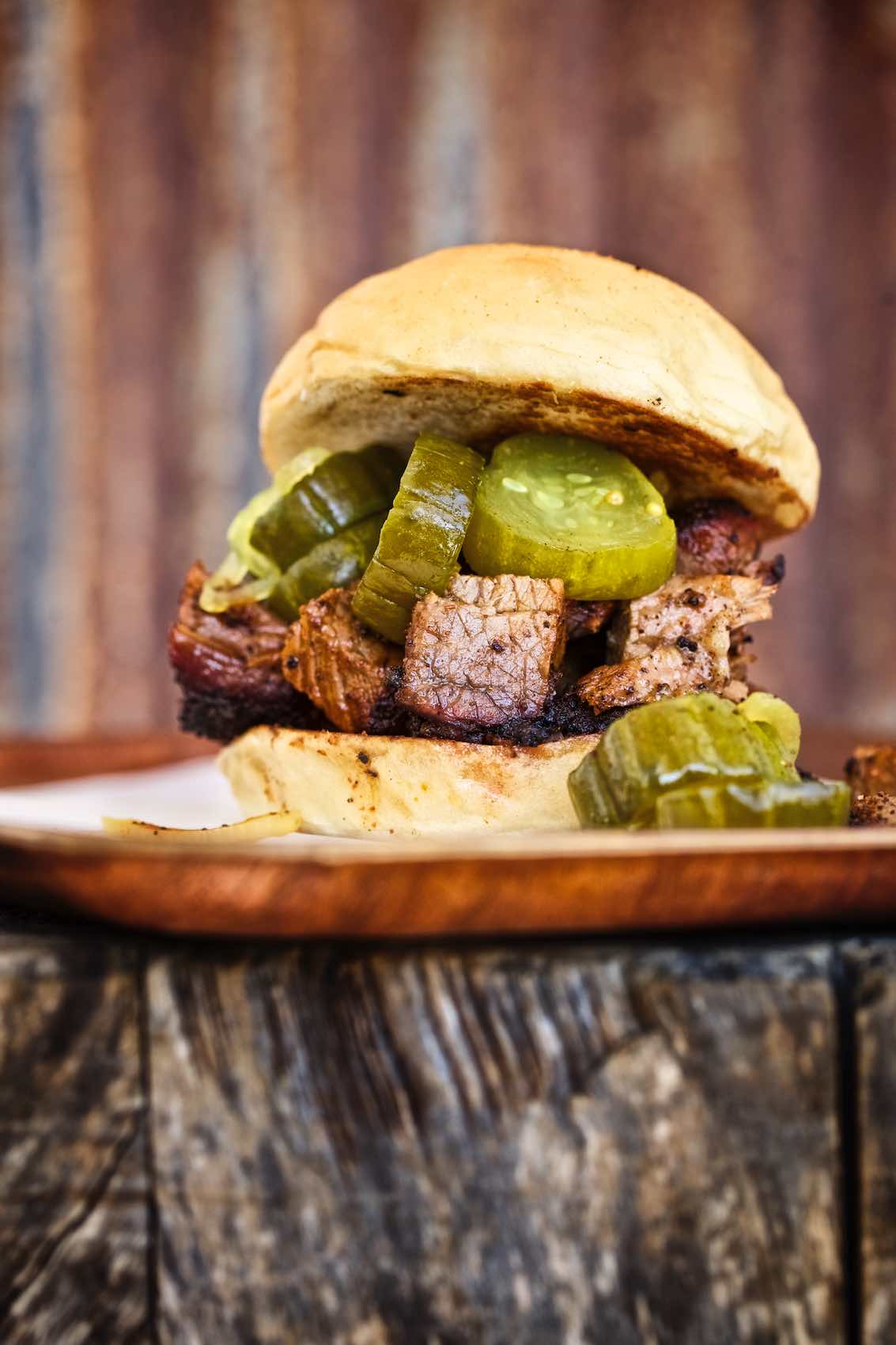 Jody Horton Photography - Barbecue sandwich with bread and butter pickles.