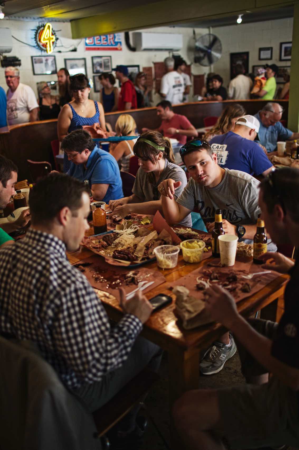 Jody Horton Photography - Guests dining inside Franklin Barbecue.