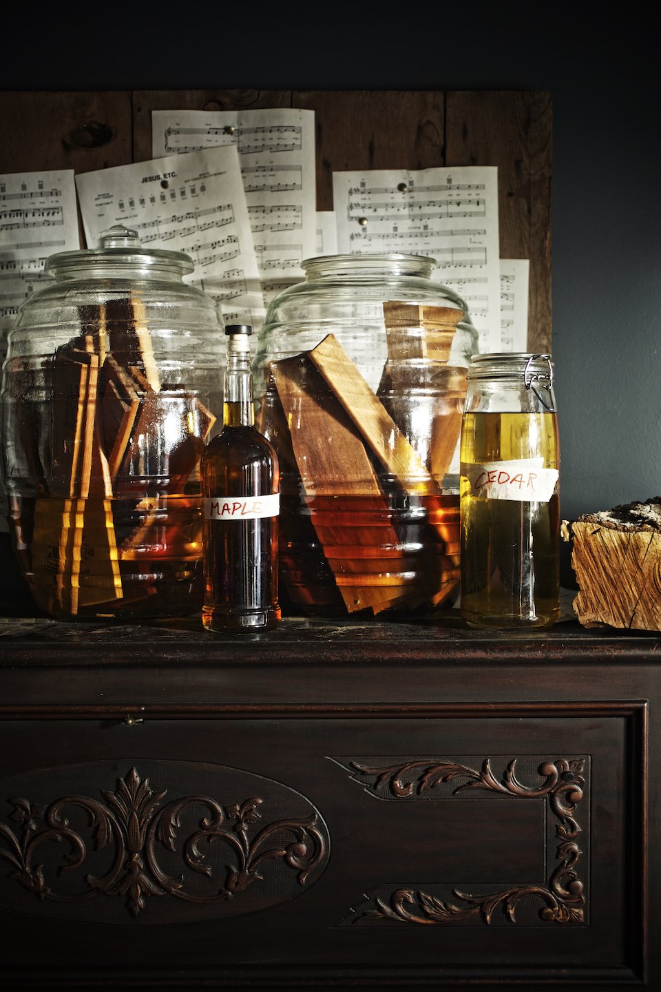 Jody Horton Photography - Essences of wood created in large glass jars.